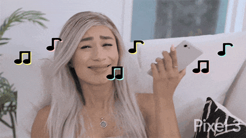Woman listening to music Woman listening to music