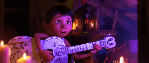 Boy playing a guitar Boy playing a guitar